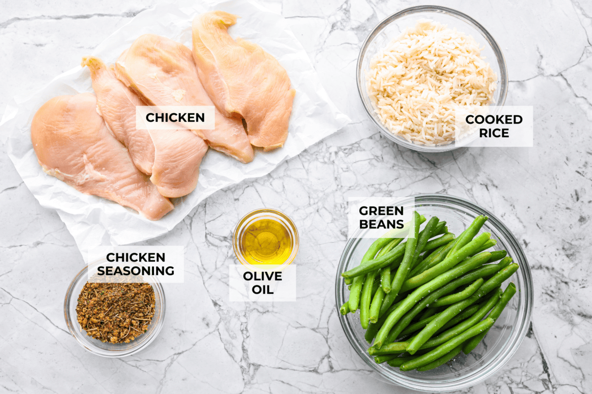 If you’re looking to save time, keep your sanity, and hit your protein goals, these chicken and rice meal prep bowls have you covered. They're flavorful, filling, and give you that “I’ve got my life together” feeling. Overhead shot of labeled ingredients.