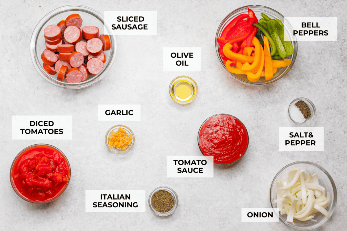 Apparently garlic fixes everything, and you knew it before I did. After a few of you suggested adding it to this Italian Sausage & Peppers, I gave it a tryโฆ and wow! Turns out, garlic takes this from good to seriously addictive. Overhead shot of labeled ingredients.