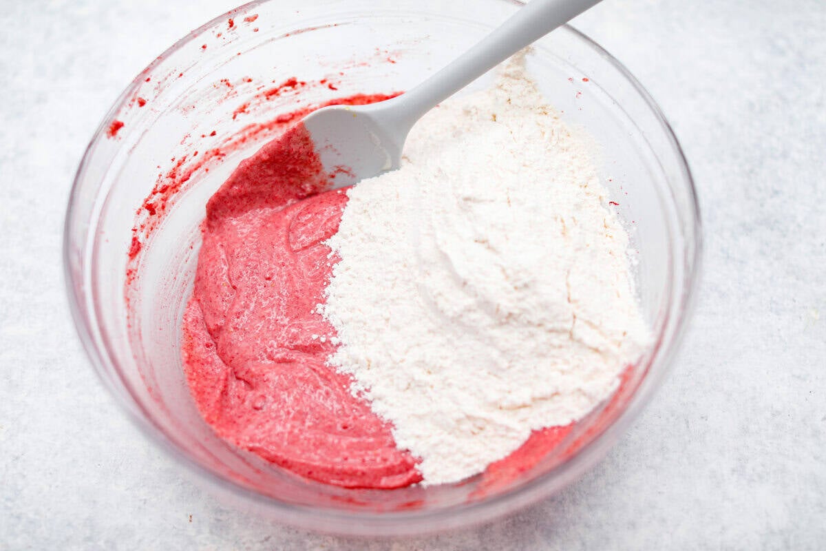 Ever since I discovered the amazing flavors that freeze-dried strawberries add, I’ve been using them as much as possible. This strawberry cake? No exception. And don’t even get me started on the frosting... It’s dangerously good. Dry ingredients added to the bowl of the wet ingredients.