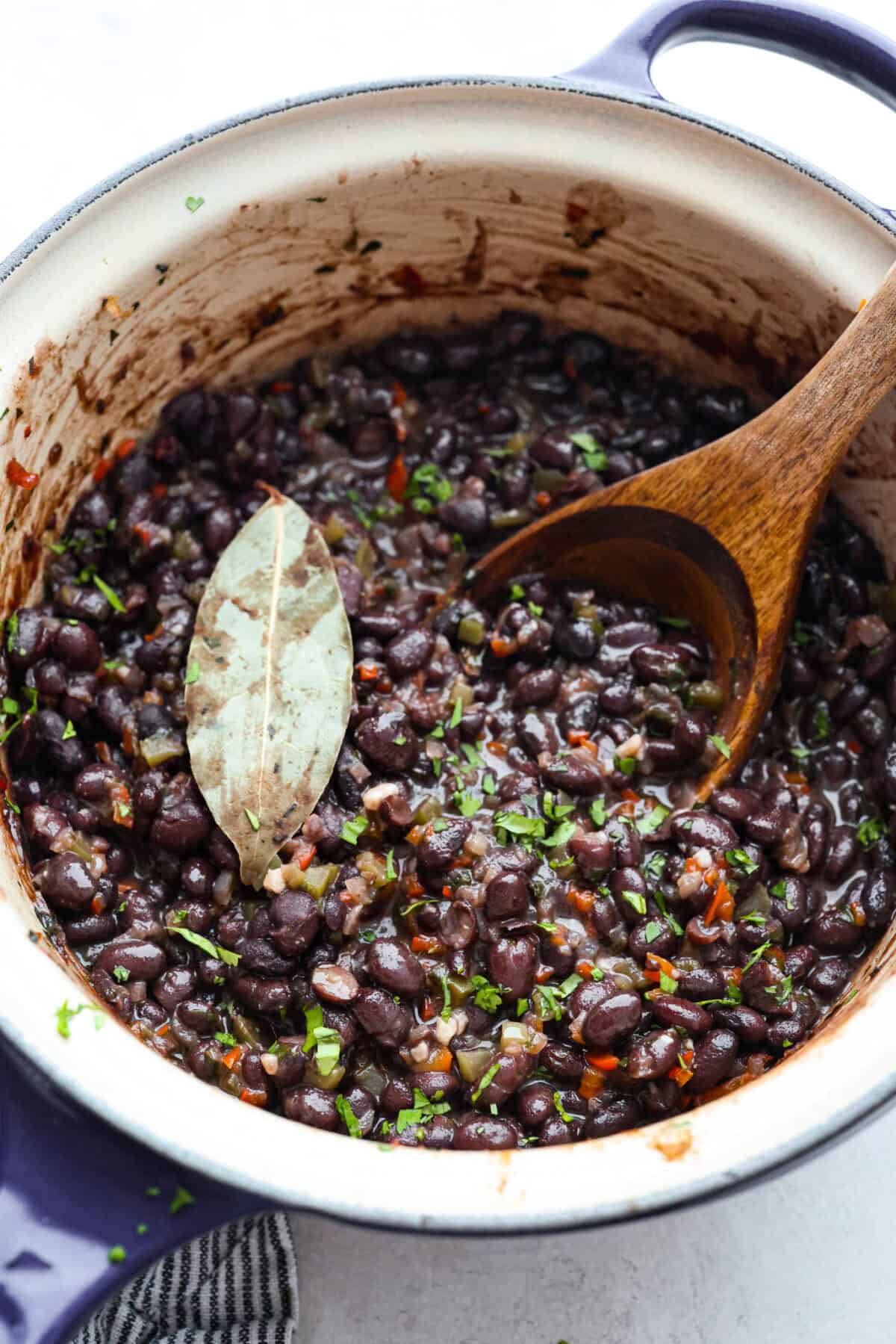 For these Cuban Black Beans, I used canned black beans to save time on soaking and cooking, so you can enjoy that rich, homemade flavor in a fraction of the time! All of the ingredients simmering together in the pot.