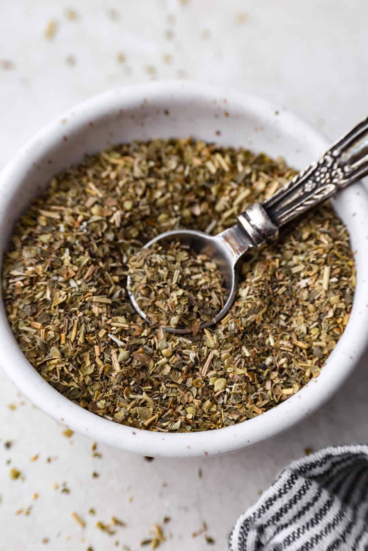 My homemade Italian seasoning is a go-to in my kitchen, and itโs quickly become a favorite with so many of you! It's bold, herby, and good enough to sprinkle on just about anything. Ingredients mixed together in a bowl.