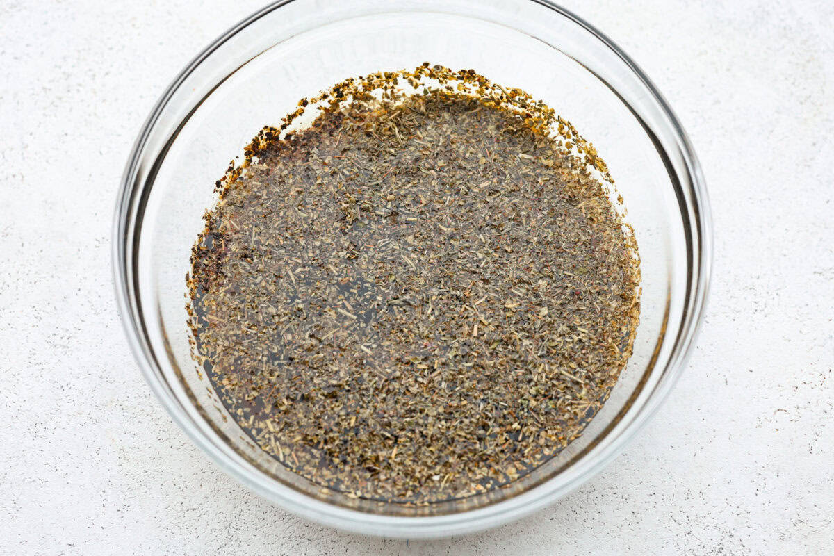 This steak marinade is one of the top recipes on my site! Itโs my go-to for turning tough, budget-friendly cuts into juicy, flavor-packed steaks that practically melt in your mouth. Bowl of combined ingredients.