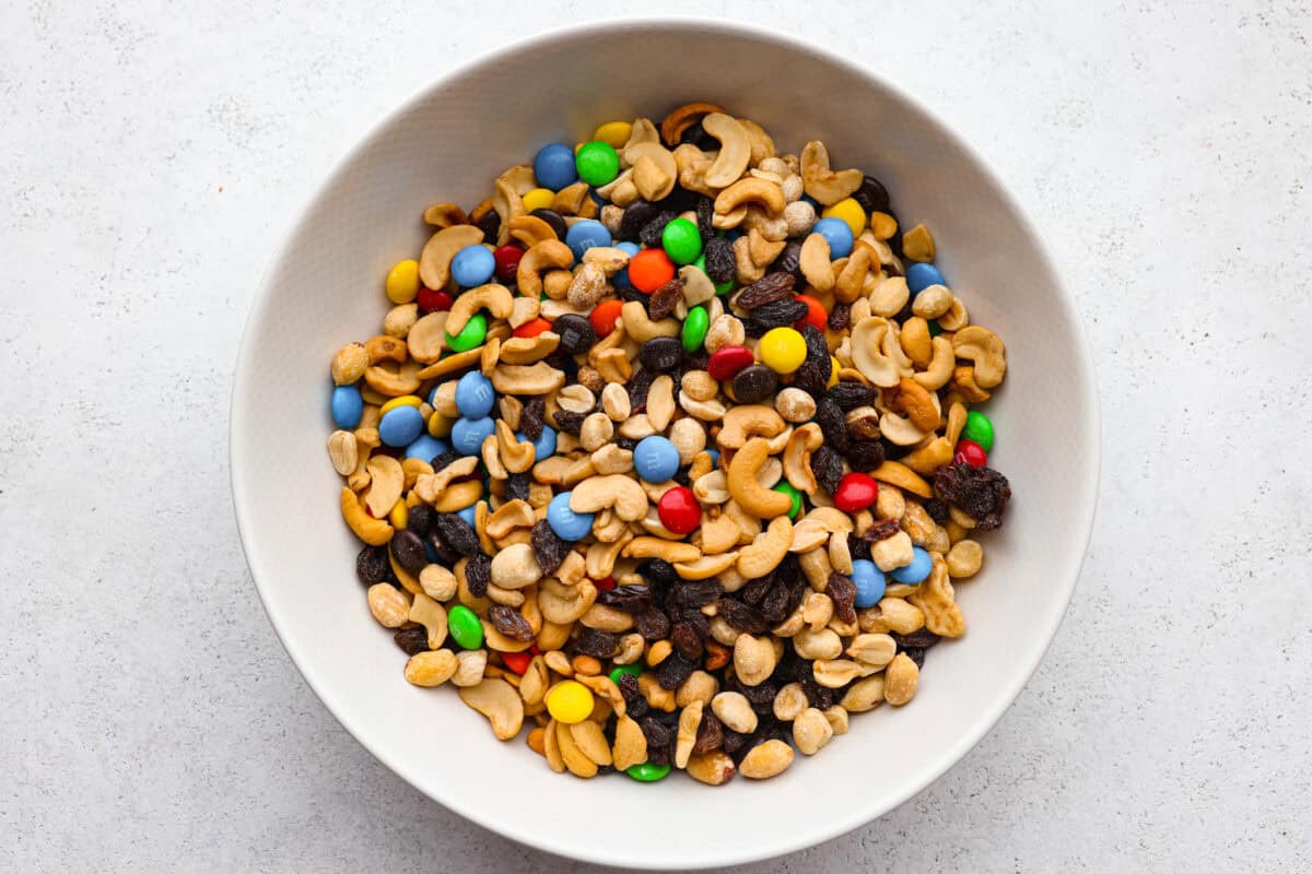 Trail mix is my go-to snack for busy days, road trips, or tossing in the kids' lunchboxes. Packed with flavor and endless mix-ins, trail mix is the perfect snack for any time! All of the ingredients mixed together.