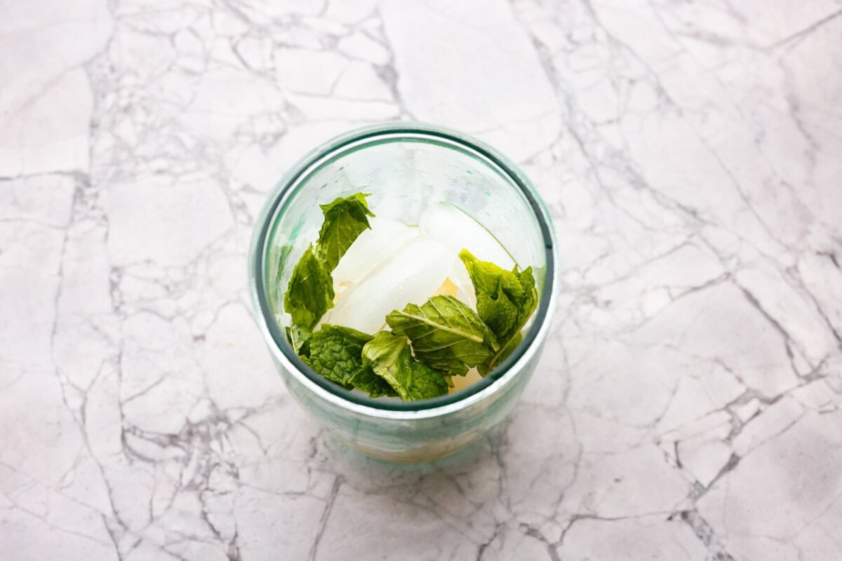 My Virgin Mojito is like a vacation in a glass. Crisp, minty, and packed with fresh lime flavor. This non-alcoholic drink is something my whole family loves! Ice, lime juice, mint leaves, and sweetener added to a cup.