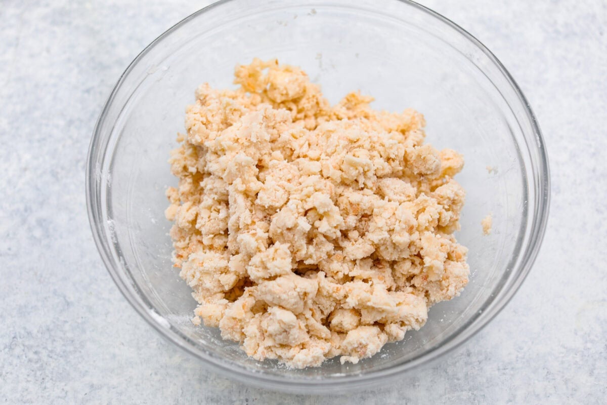 My Dad LOVES coconut cream pie! When I don't have it in me to make a pie, I make this easy Coconut Lush dessert! Itโs rich, dreamy, and always the first dessert to disappear at family gatherings. Crust ingredients mixed together.