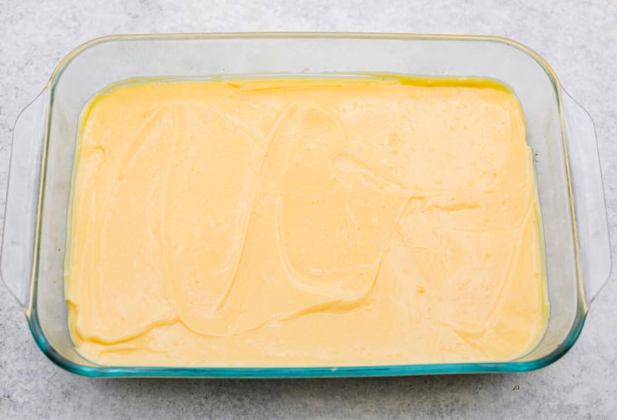 My Dad LOVES coconut cream pie! When I don't have it in me to make a pie, I make this easy Coconut Lush dessert! Itโs rich, dreamy, and always the first dessert to disappear at family gatherings. Pudding spread on top of the cream cheese layer.