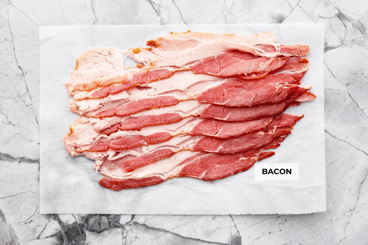 You know how much I love my air fryer, and this might be my favorite hack yet: Air Fryer Bacon! It’s ready in 10 minutes, no flipping, no mess, and turns out perfectly crispy every single time Overhead shot of labeled ingredients.