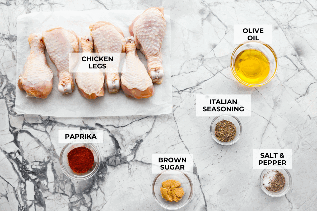 My kids always fight over who gets the chicken legs. With this Air Fryer Chicken Legs recipe, I can whip up a few batches and keep everyone happy! The bold flavor and crispy air-fried skin are totally unbeatable. Overhead shot of labeled ingredients.