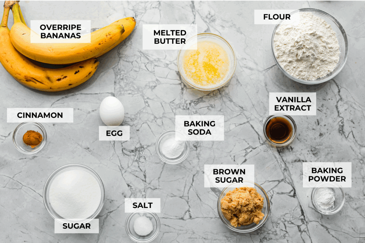 When my bananas start to turn brown and the kids need something quick, these banana muffins always save the day. They’re soft, sweet, and come together fast. Overhead shot of labeled ingredients.