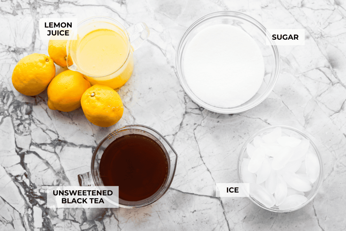 If you love iced tea, youโre going to be obsessed with this Arnold Palmer. The combo of crisp black tea and tangy lemonade is pure summer magic. Itโs simple, refreshing, and always just what you need. Overhead shot of labeled ingredients.