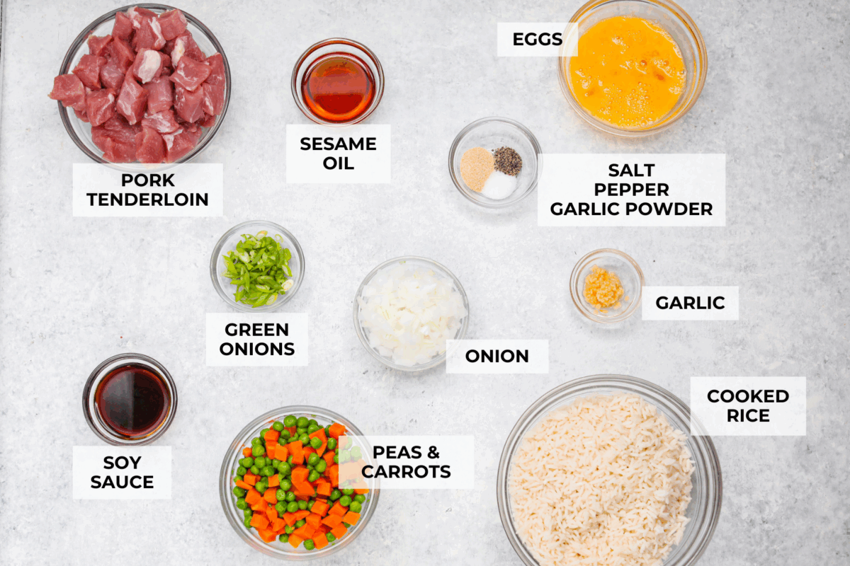 You guys know how I feel about fried rice, itโs my go-to for leftover rice and whatever meatโs in the fridge. Pork Fried Rice is savory and satisfying. With tender pork, fluffy eggs, and veggies all in one pan, itโs the ultimate weeknight win. Overhead shot of labeled ingredients.