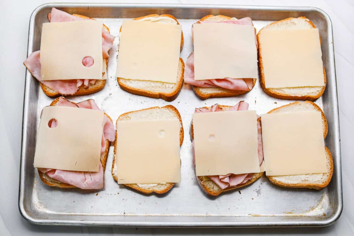 Cheese added to the top of the ham.