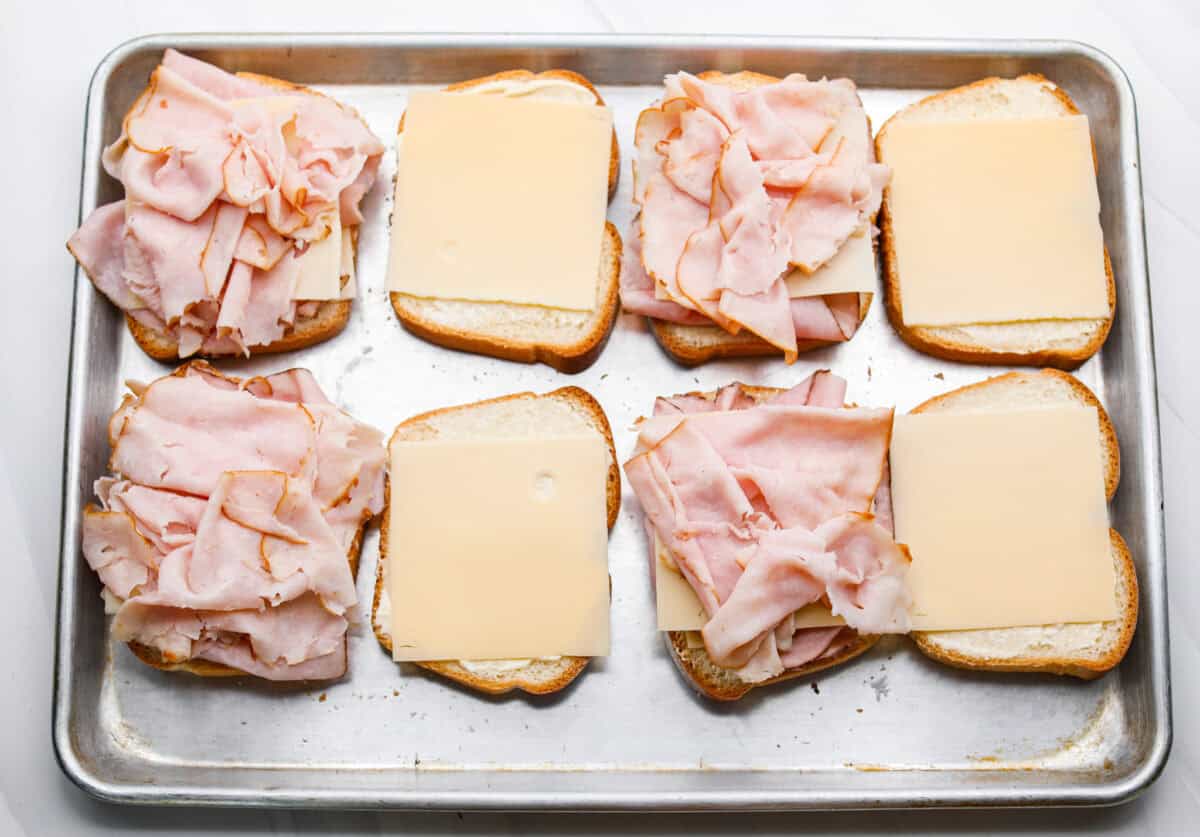 I had my first Monte Cristo sandwich at Disneyland and knew I had to recreate it at home! The melty cheese, savory ham and turkey, and golden-fried French toast bread deliver all the magic without the theme park ticket. Turkey added to the top of the cheese and ham.