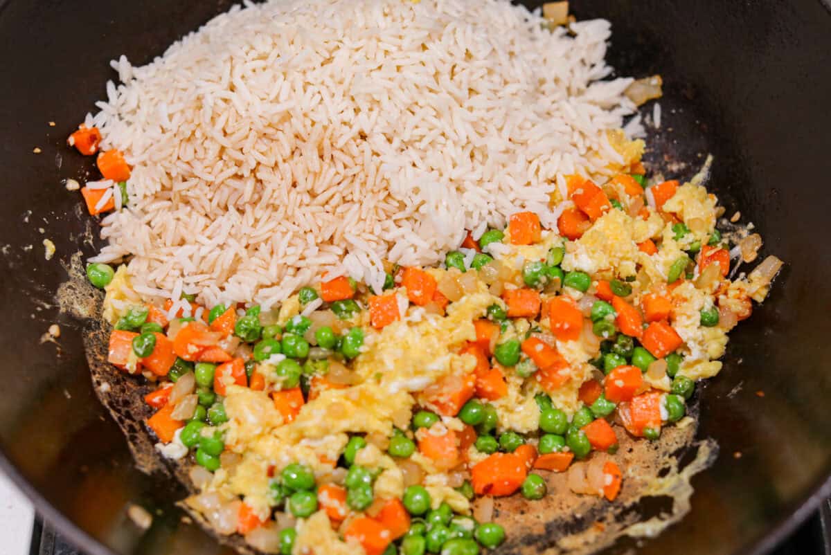 You guys know how I feel about fried rice, itโs my go-to for leftover rice and whatever meatโs in the fridge. Pork Fried Rice is savory and satisfying. With tender pork, fluffy eggs, and veggies all in one pan, itโs the ultimate weeknight win. Rice, sauce and seasonings added to the veggies and eggs.
