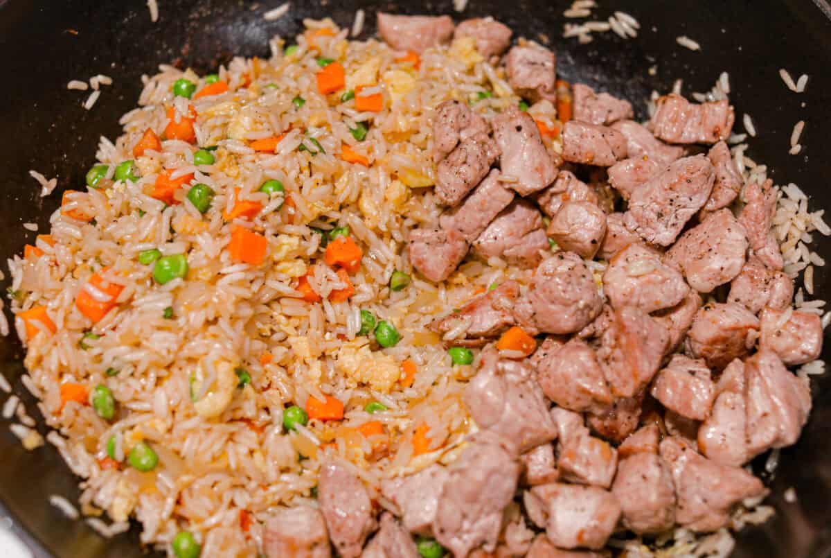 You guys know how I feel about fried rice, itโs my go-to for leftover rice and whatever meatโs in the fridge. Pork Fried Rice is savory and satisfying. With tender pork, fluffy eggs, and veggies all in one pan, itโs the ultimate weeknight win. Pork added back to the rice mixture.