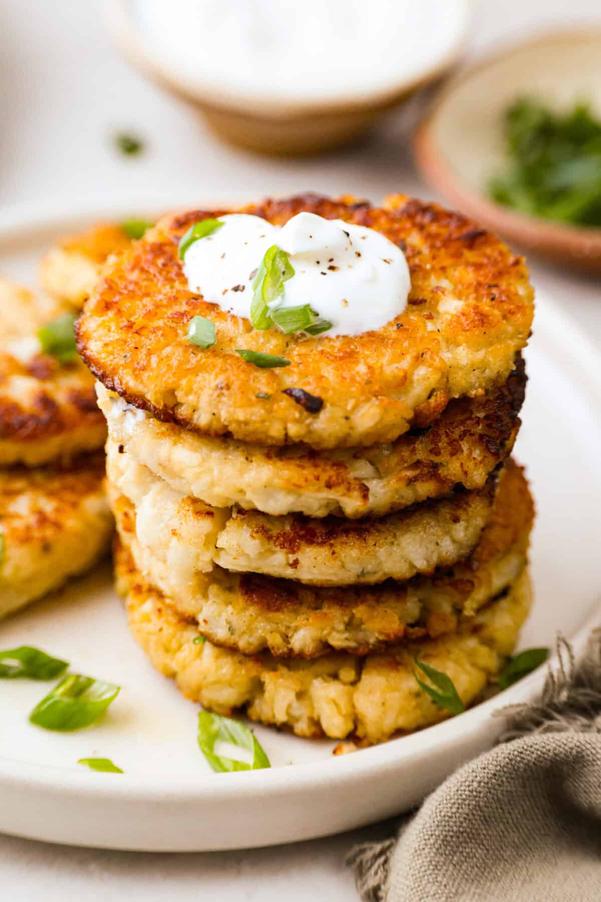 Stack of crispy cauliflower fritters. 