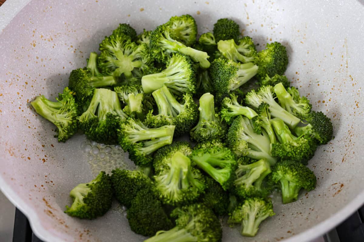 You could order takeoutโฆ or you could make my better-than-takeout hoisin chicken! It has no weird oils, no soggy broccoli. Just crisp, juicy chicken, perfectly sauced with that sweet-savory hoisin magic. Broccoli steaming in a skillet.