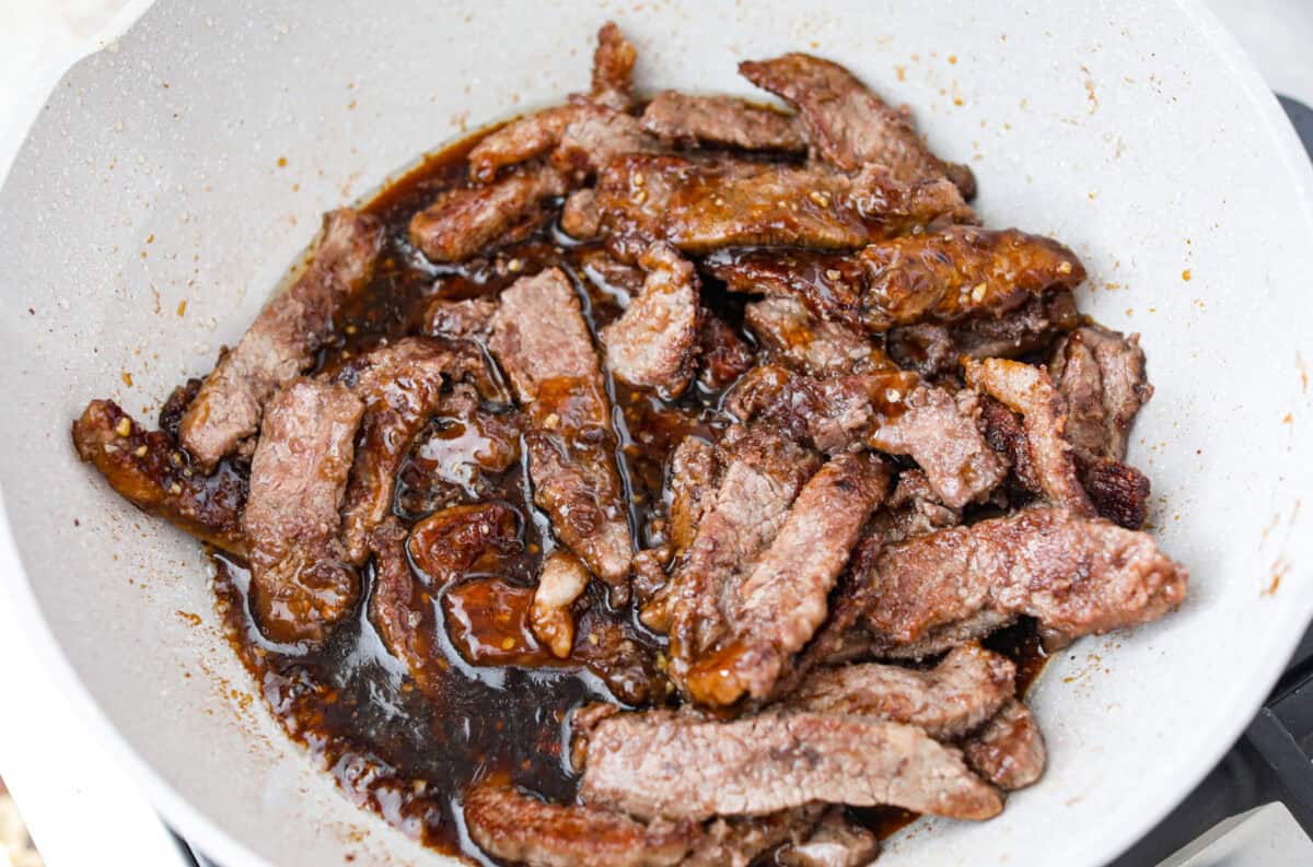 My family is obsessed with my better-than-takeout Beef Teriyaki. The secret? Velveting the beef! It’s simple, but it makes it unbelievably tender. Trust me, you’ll want this trick in your back pocket. Beef added to the sauce to finish cooking.