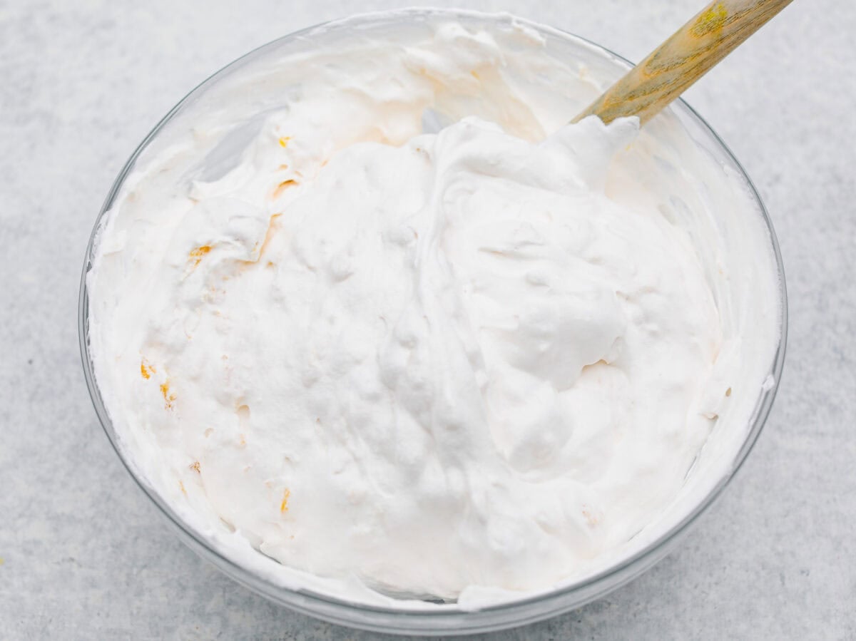 Craving a bright and sunny dessert? This pineapple delight will hit the spot! With a buttery crust, creamy filling, and sweet pineapple topping, it’s light, tropical, and totally irresistible! Pineapple added to the whipped topping.