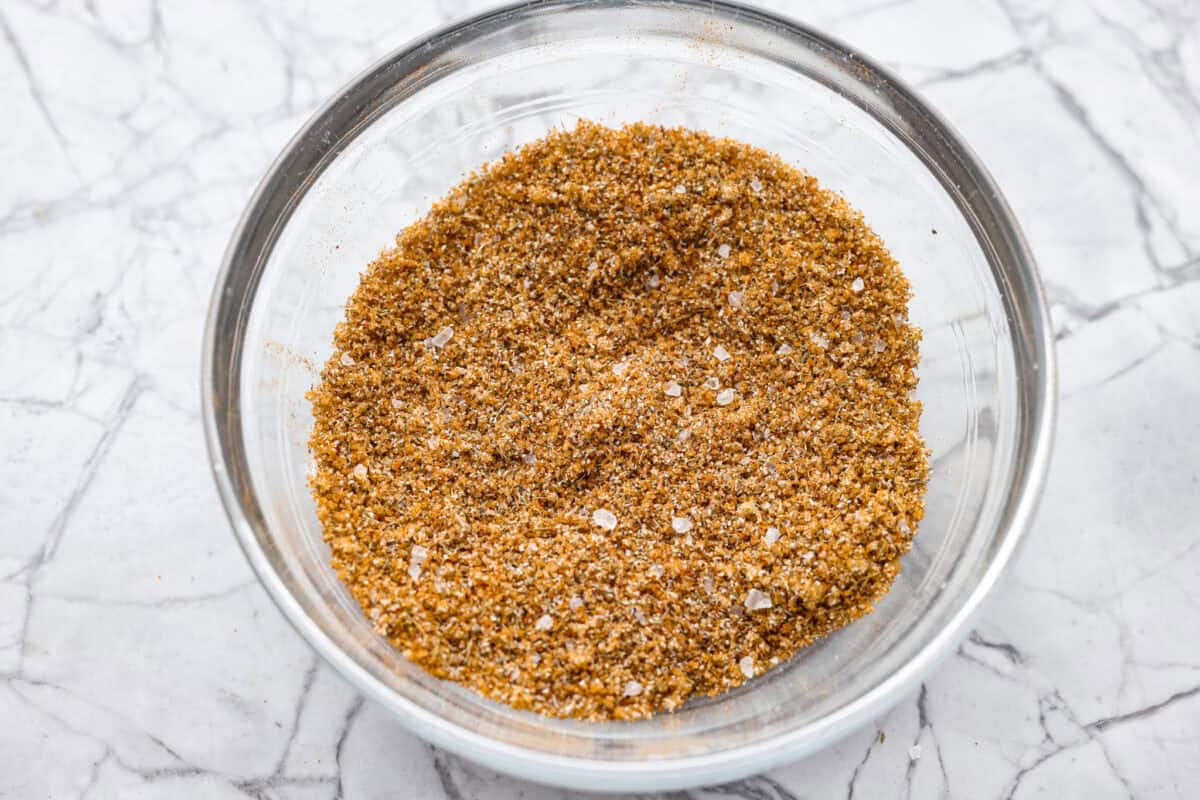Air fryer pork tenderloin is the ultimate weeknight dinner hero! It's quick, juicy, and packed with flavor! It cooks up perfectly with minimal effort, thanks to a simple marinade and the magic of the air fryer. Spice rub ingredients all mixed together in a bowl.