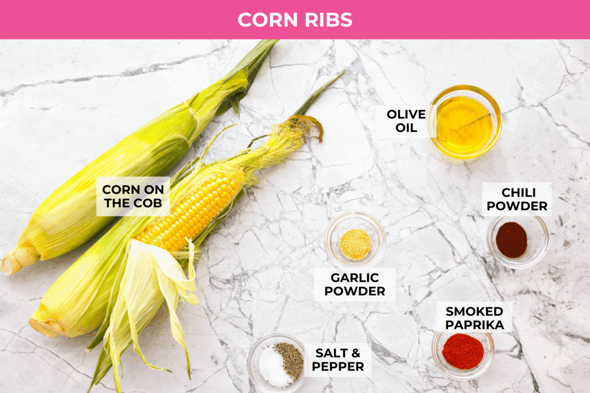 I had to try these viral Corn Ribs, and now I totally get the hype! They're fun, handheld, and smothered in creamy, zesty Mexican street corn flavor. Make a batch to share... or donโt. I wonโt judge. Overhead shot of labeled corn rib ingredients.