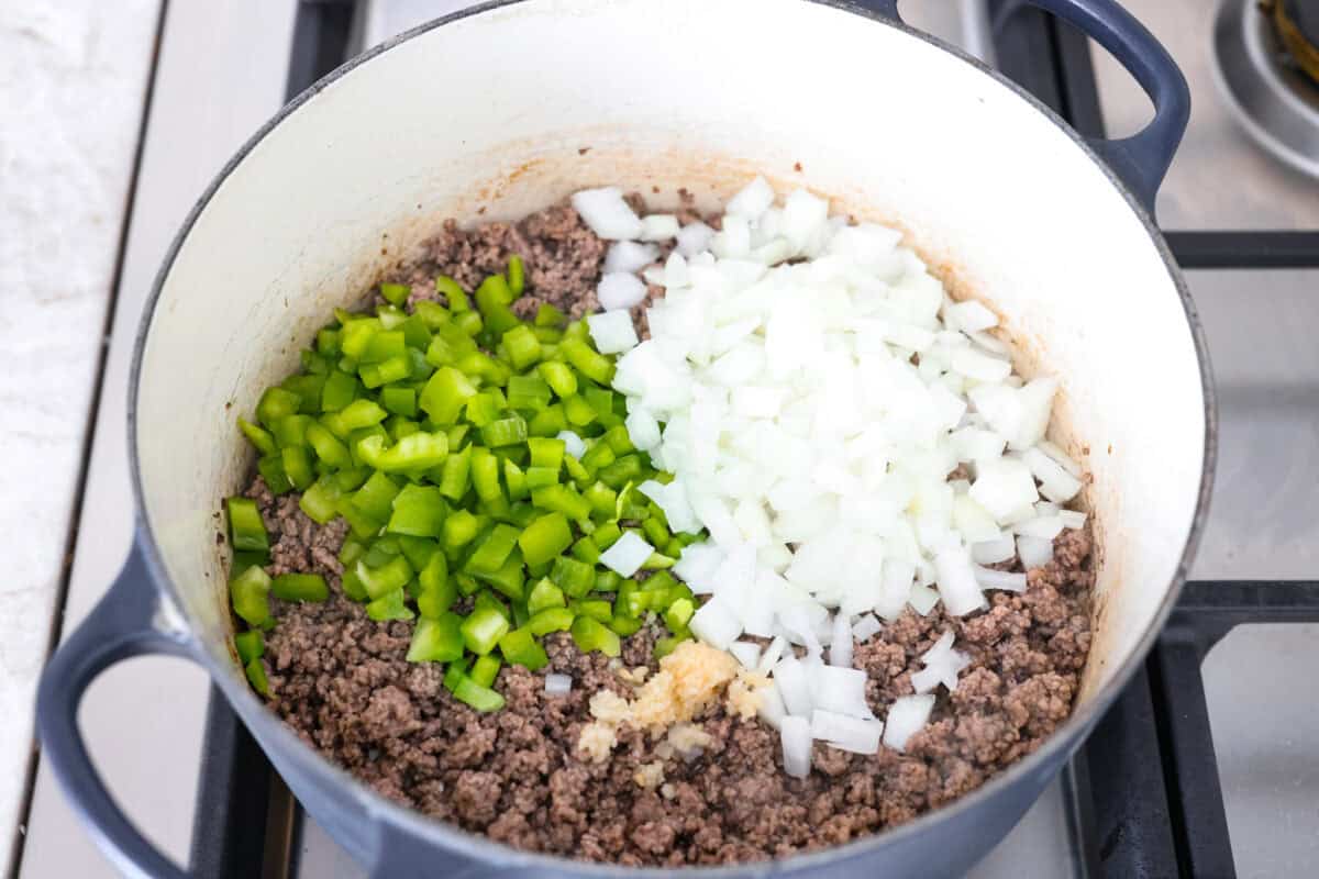 I'm telling you right now, this is the BEST chili you will ever have. The reviews don't lie! It's hearty, flavorful, and oh-so-comforting. It's packed with ground beef, beans, tomatoes, and bold spices. Get creative with your toppings and dig in! Cooked beef with peppers, onions and seasonings.