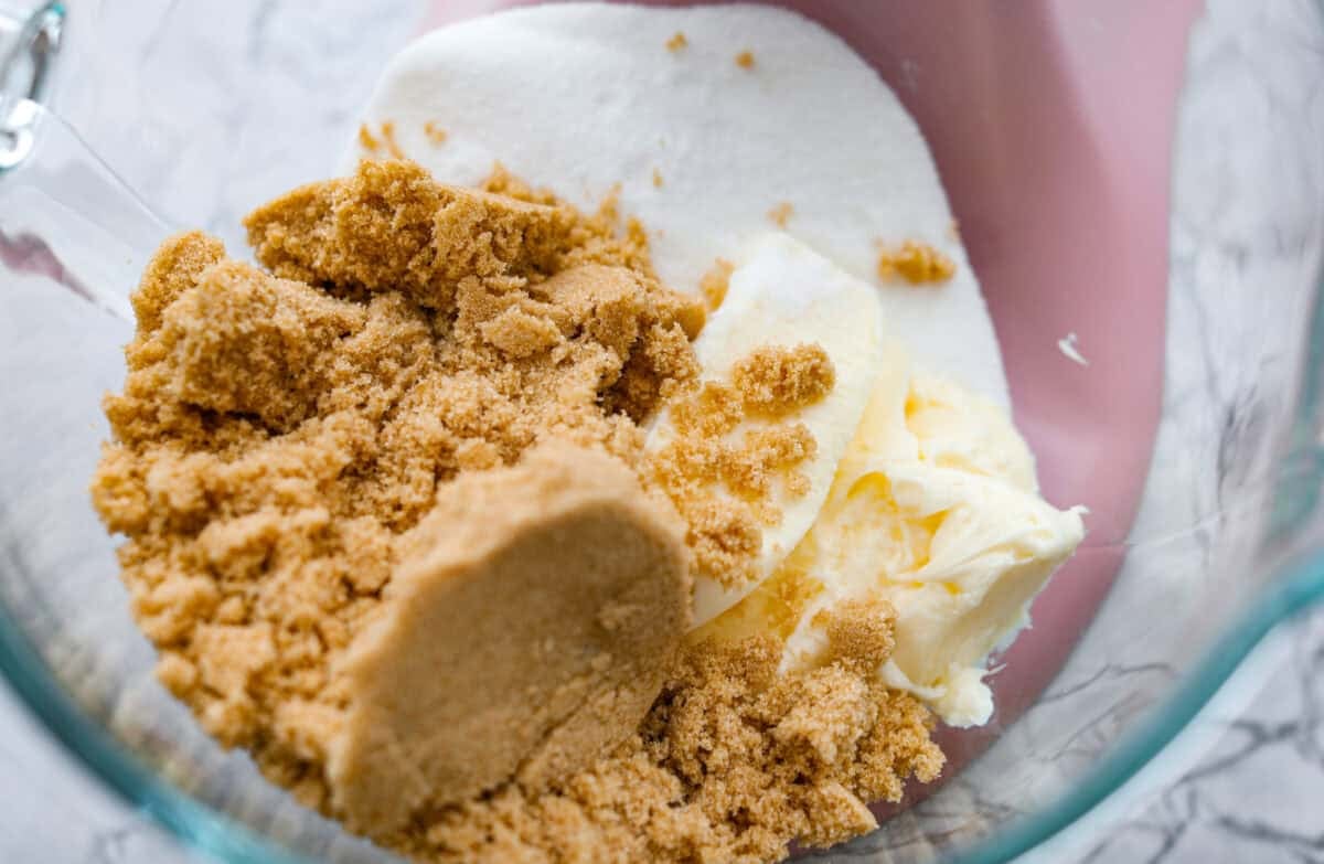 These copycat Crumbl cookies are HUGE, buttery, and loaded with melty chocolate chips. Fresh out of the oven, they just might be even better than the real deal. Bake a batch, do a taste test, and let me know if you like these better! Sugar and butter in the bottom of a stand mixer bowl.