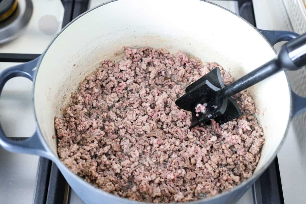 Why is it called โdirtyโ rice? The rice gets brown as it cooks with meat, Cajun spices, and the holy trinity of Cajun cooking: onion, bell pepper, and celery. My version combines ground pork and beef for a flavorful twist on this Louisiana classic! Ground beef and pork cooking in a pot.
