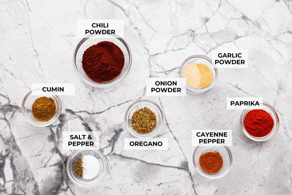 This homemade chili seasoning is the perfect blend of spices to give your chili bold, hearty flavor. Itโs quick to mix up, tastes way better than store-bought, and can be used in so many dishes! Overhead shot of labeled ingredients.