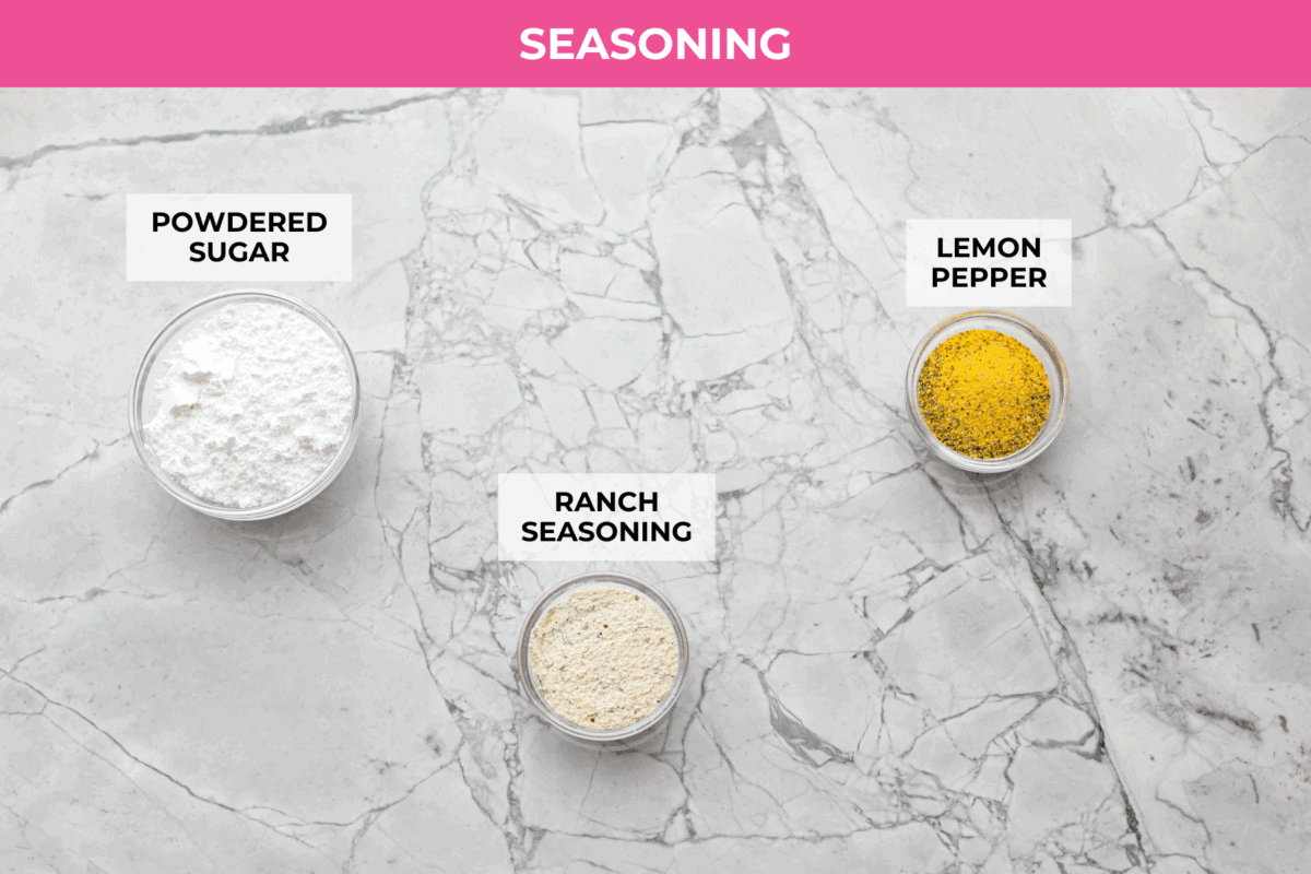 Meet your new wing obsession: Crack Wings. Salty, tangy, peppery, with a touch of sweetness. I've never seen a wing with a powder dusting so full of flavor! They are addictive because of the salty and sweet combo with that hint of heat. Overhead shot of labeled crack chicken seasoning ingredients.