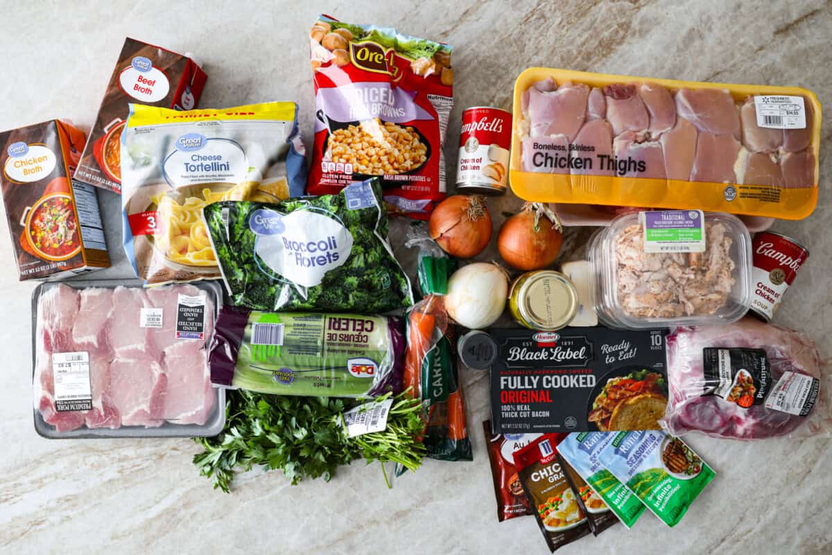 This time I wanted to make things even easier, so every single one of these recipes is a true dump and go meal. Freezer meal ingredients laid out on the counter.