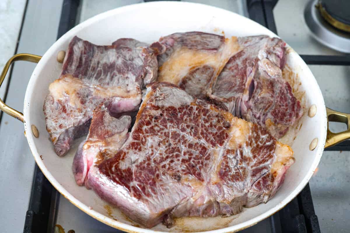 Slow cooker barbacoa beef simmers all day in smoky chipotle, tangy lime, and warm spices until it falls apart. Itโs perfect for tacos, burritos, bowls, or nachos, all with that taquerรญa-style flavor at home. Browning beef in a hot skillet.