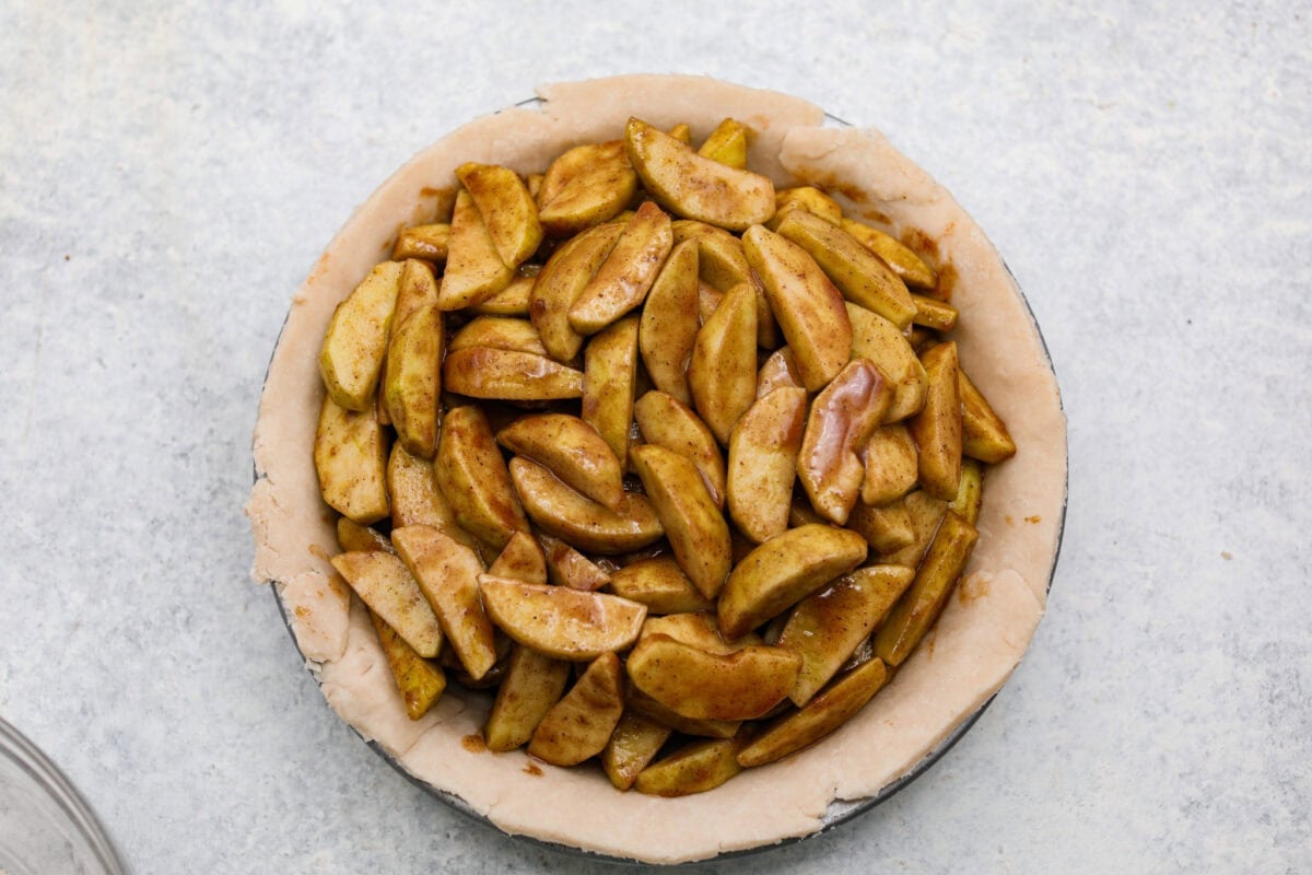 This brown bag apple pie is simple, foolproof, and downright delicious! The secret? It bakes right inside a paper bag, keeping the crust golden, the filling perfectly tender, and your oven mess-free. Apple filling added to the pie crust.