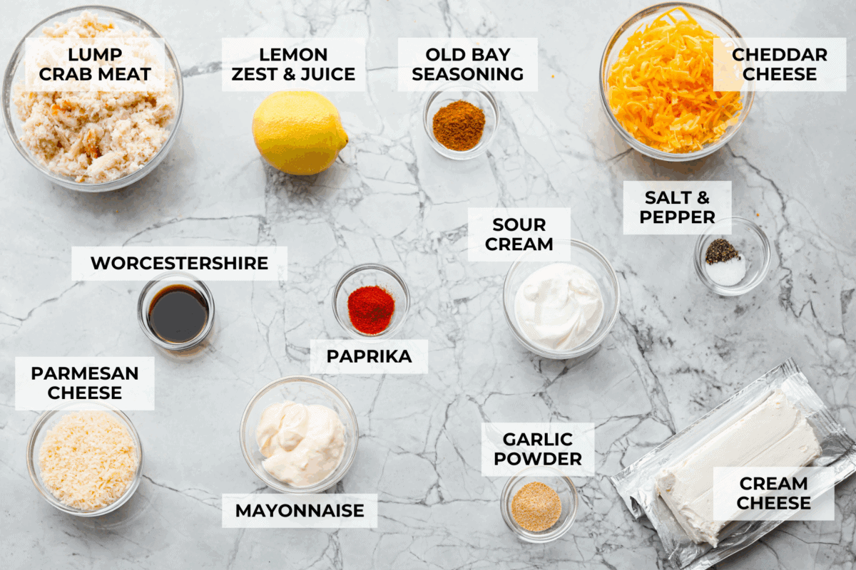 My hot crab dip is one of those recipes you have to try. Itโs creamy, cheesy, and irresistible. Ready in about 30 minutes, itโs my go-to when I want something that feels fancy but takes zero effort. Overhead image of labeled ingredients.