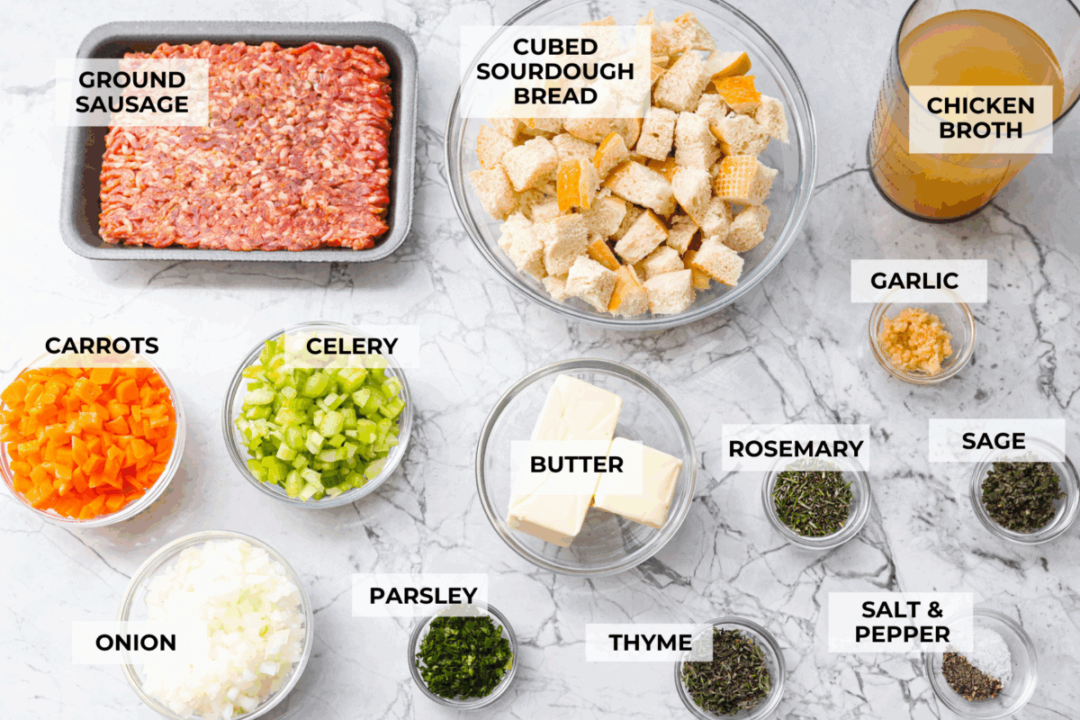 Why did it take me this long to use it in stuffing? Sourdough Stuffing's tangy crustย and the chewy middleย are perfection! Every bite soaks up all that buttery, herby goodness like it was made for this. Overhead shot of labeled ingredients.