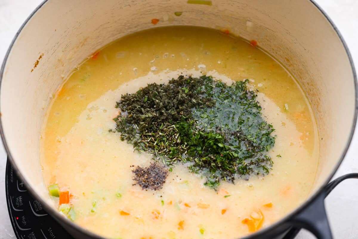 Why did it take me this long to use it in stuffing? Sourdough Stuffing's tangy crustย and the chewy middleย are perfection! Every bite soaks up all that buttery, herby goodness like it was made for this. Fresh herbs added to the broth and veggie mixture.