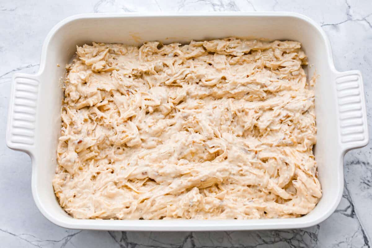 Creamy, cheesy, and packed with shredded chicken, this French onion chicken casserole is comfort food at its best! Inspired by French onion soup and dip, it’s topped with crispy fried onions for a crunchy finish. Ingredients all mixed together and added to a baking dish.