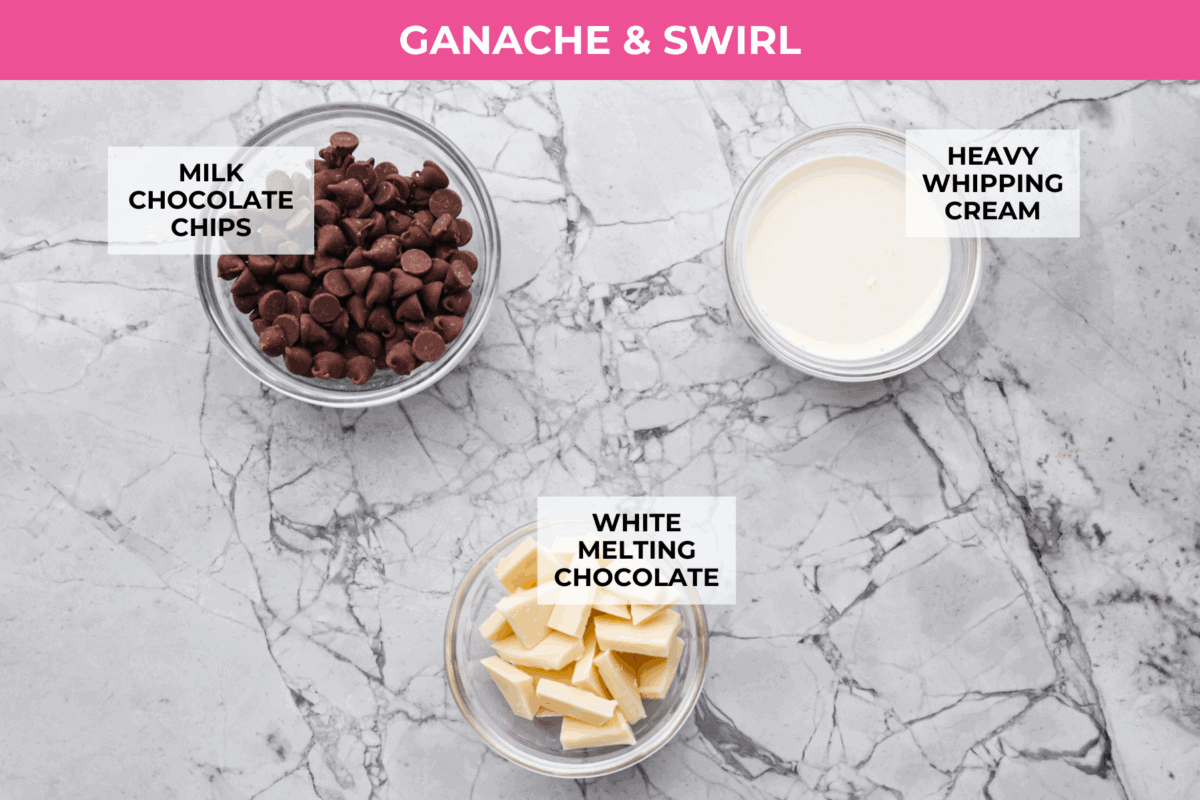 These Hostess Cupcake Cookies take your favorite childhood treat and turn it into soft, chocolate cookies! They are topped with sweet marshmallow and smooth chocolate ganache, and of course, the classic white swirl! Overhead shot of labeled chocolate ganache and white chocolate swirl ingredients.
