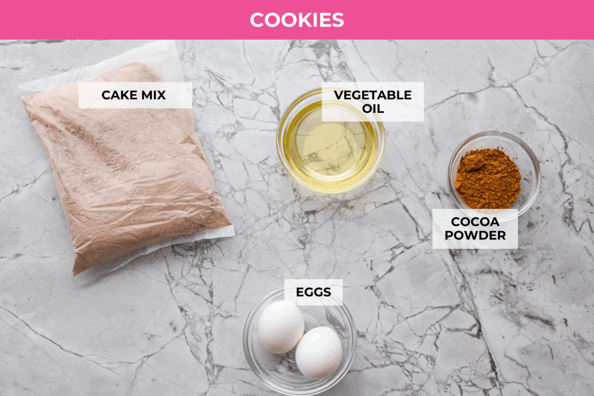 Hostess Cupcake Cookies are soft chocolate cookies filled with sweet marshmallow and topped with smooth chocolate ganache. They’re rich, fun, and always a hit. Overhead shot of labeled Hostess Cupcake cookies ingredients.