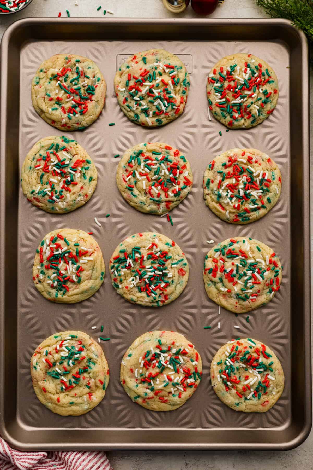 These sprinkle cookies are pure joy. Soft centers, chewy edges, and lots of colorful sprinkles! They are perfect for Christmas parties, cookie exchanges, and neighbor gifts.