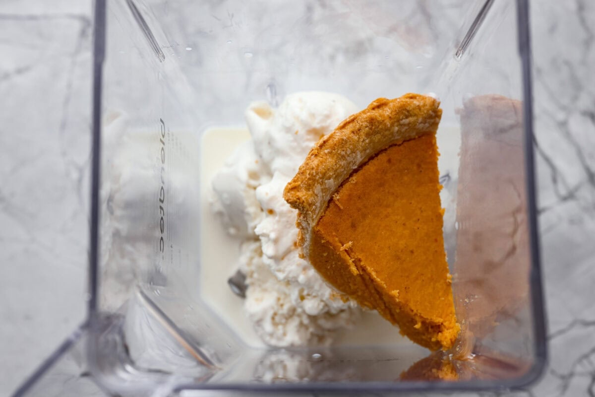 Leftover pie milkshakes are the sweetest way to give your extra pie new life! Just grab a slice, blend it with creamy ice cream, and sip your way to dessert bliss. Slice of pie, milk, and ice cream added to a blender.