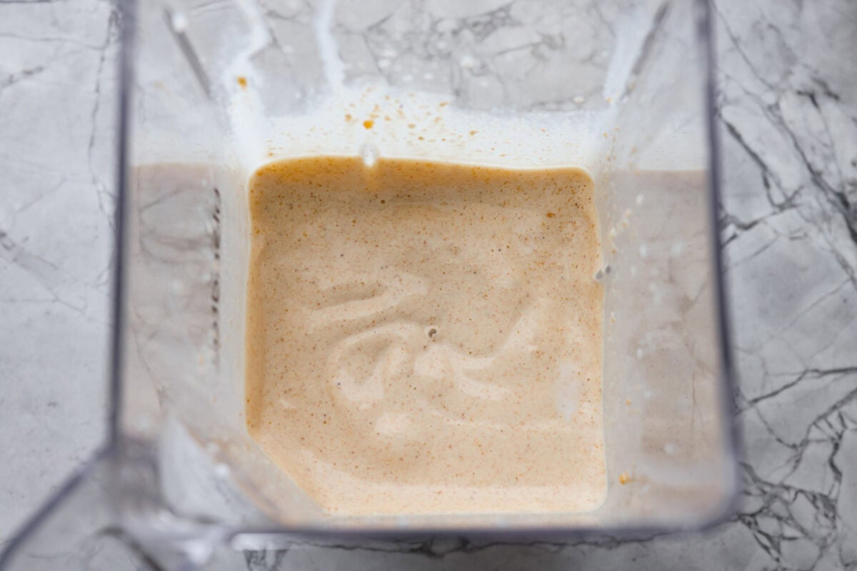 Leftover pie milkshakes are the sweetest way to give your extra pie new life! Just grab a slice, blend it with creamy ice cream, and sip your way to dessert bliss. Pie milkshake ingredients blended up in a blender.
