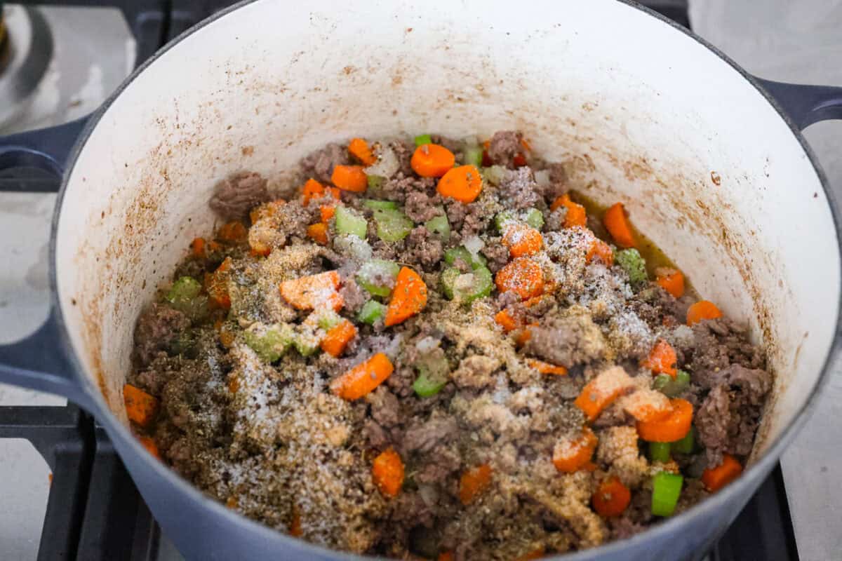 Shipwreck stew is a one-pot dinner that keeps things simple and affordable. Ground beef, tender potatoes, and everyday vegetables cook together in a rich tomato broth. It makes a cozy, filling meal without extra dishes or extra cost. Seasonings added to the cooked beef and veggies.