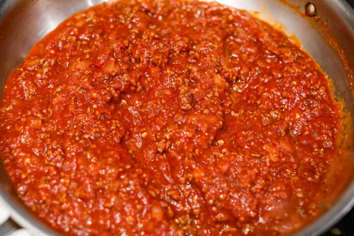 This easy slow cooker lasagna layers tender noodles with rich meat sauce and three cheeses, all with just 25 minutes of hands on prep. You get classic, cozy lasagna flavor that melds into every bite from slow cooking all day! Marinara sauce added to the ground beef and and onion mixture.