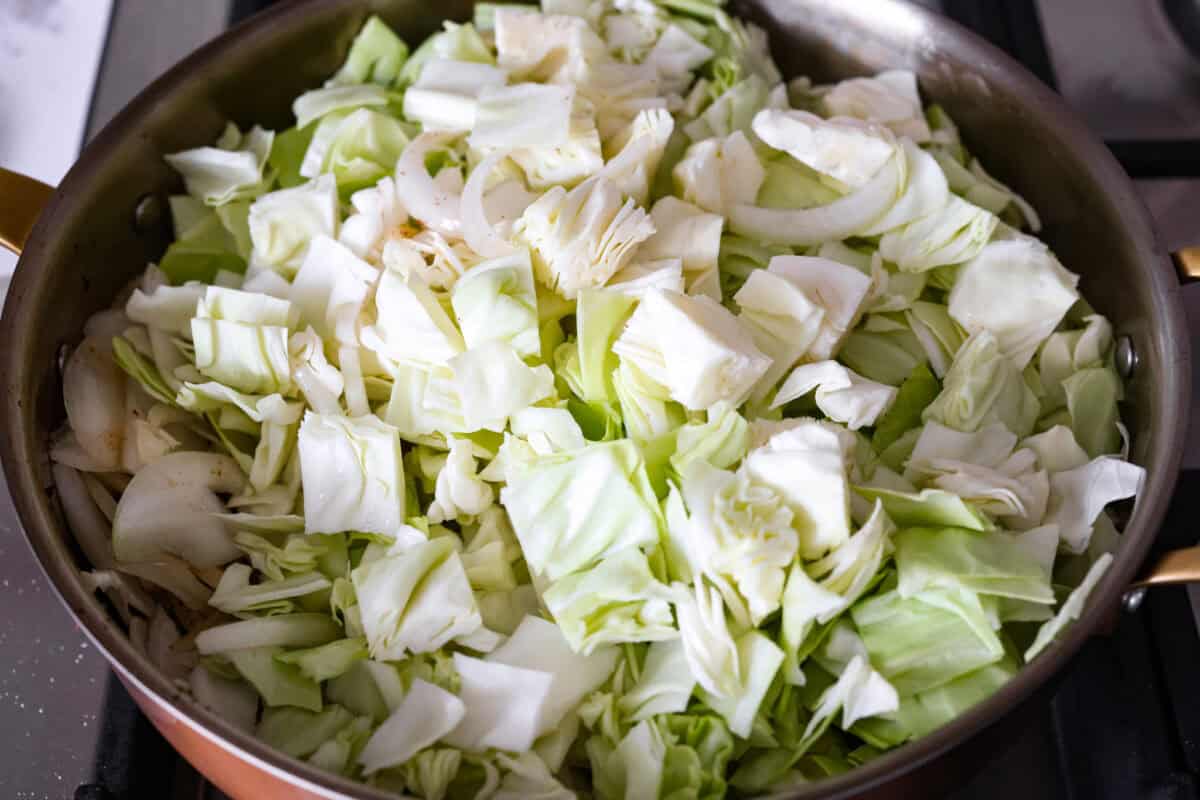 You donโt need fancy ingredients to make something great, and this fried cabbage proves that! Bacon, cabbage, a little seasoning, and a hot skillet. Thatโs it. And it works every single time. Cut up cabbage in a skillet.