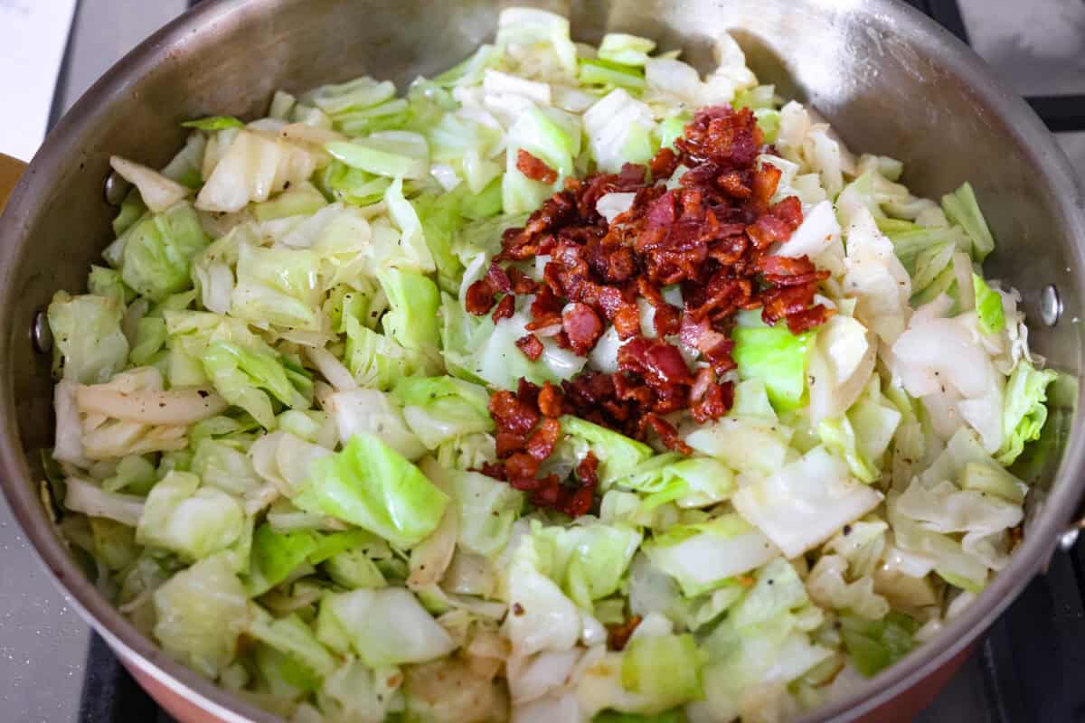 You donโt need fancy ingredients to make something great, and this fried cabbage proves that! Bacon, cabbage, a little seasoning, and a hot skillet. Thatโs it. And it works every single time. Bacon added back to the skillet withe the cooked cabbage.