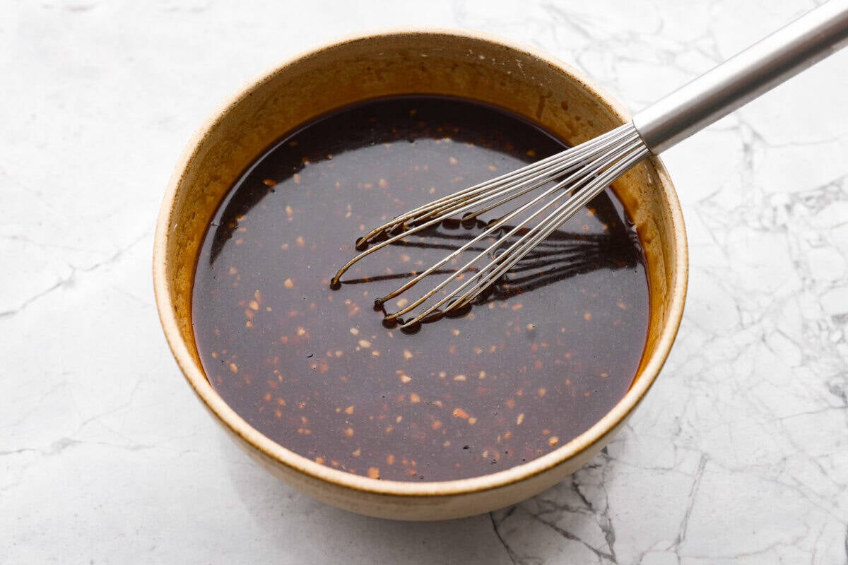 You love my baked General Tso’s chicken, so obviously, I had to make a faster one. This one pan General Tso's chicken is sticky, saucy, and on the table in about 30 minutes. Sauce ingredients whisked together in a bowl.