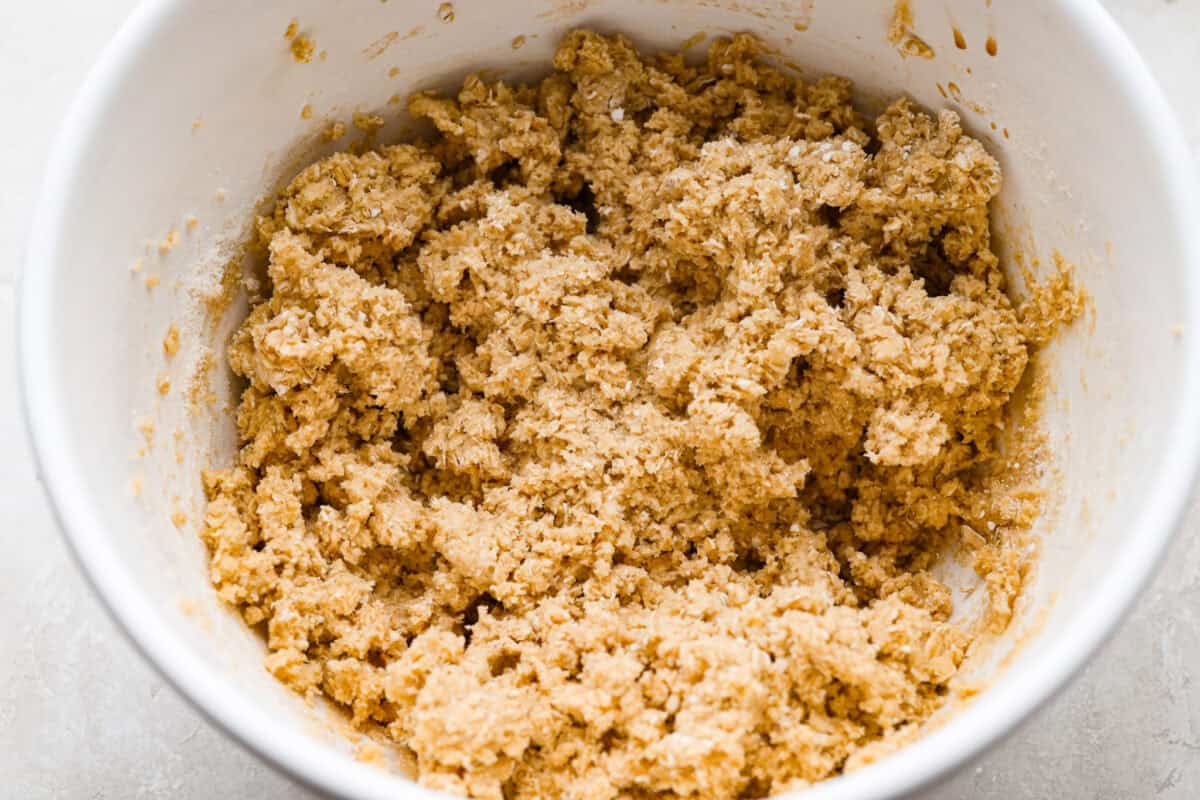 These Neiman Marcus Chocolate Chip Cookies come with a famous backstory, but the real star is the cookie itself. Thick, chewy, and packed with oats, two kinds of chocolate, and crunchy walnuts, theyโre truly worth the hype. Wet and dry ingredients combined and mixed together in a bowl.