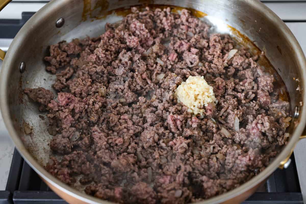 Cheeseburger rice is everything you love about a juicy cheeseburger, made easy in one skillet. Hearty, cheesy, and packed with flavor, itโs the ultimate weeknight comfort meal. Ground beef and garlic cooking in a skillet.