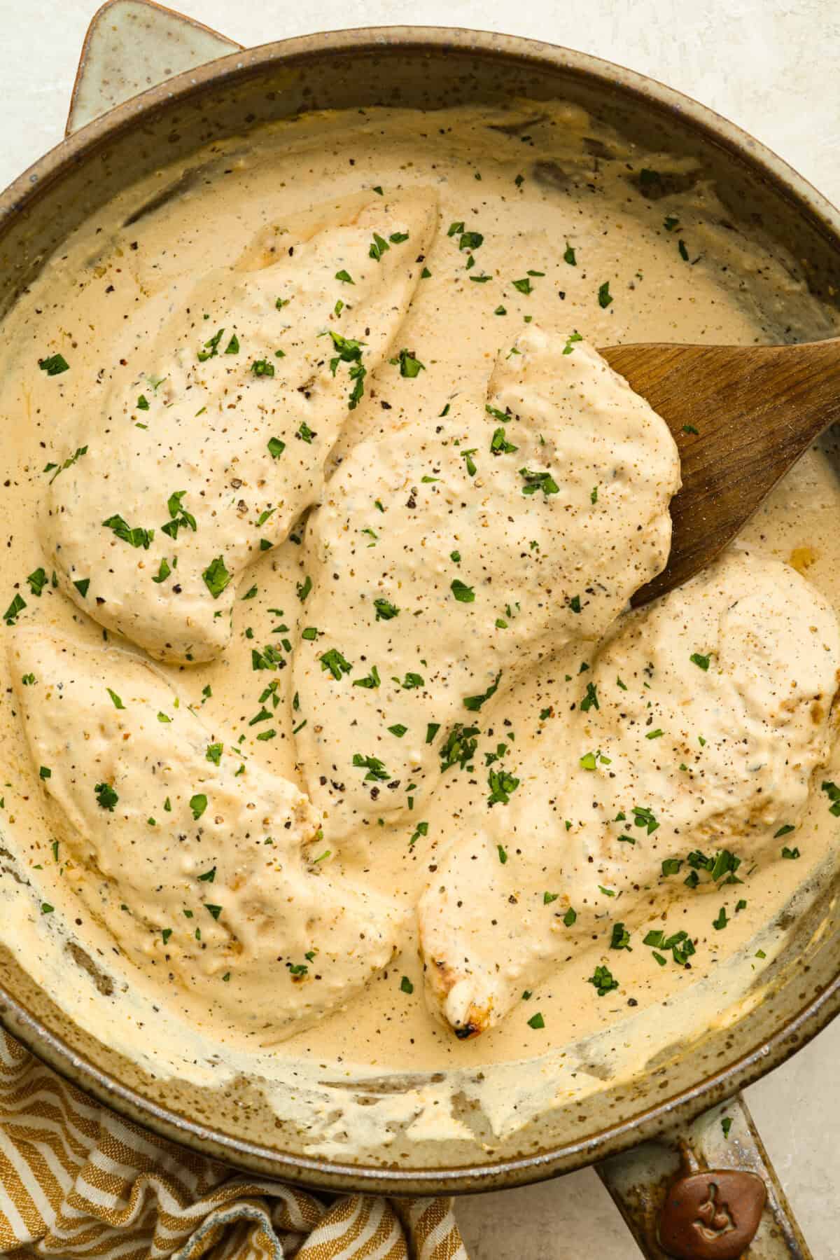 I'm excited for you guys to try this cream cheese chicken. It's an easy one-pan dinner with a rich, creamy sauce that delivers pure comfort food vibes. Itโs quick to make, easy to clean up, and perfect for cozying up on a busy night. Cream cheese chicken in the pan.